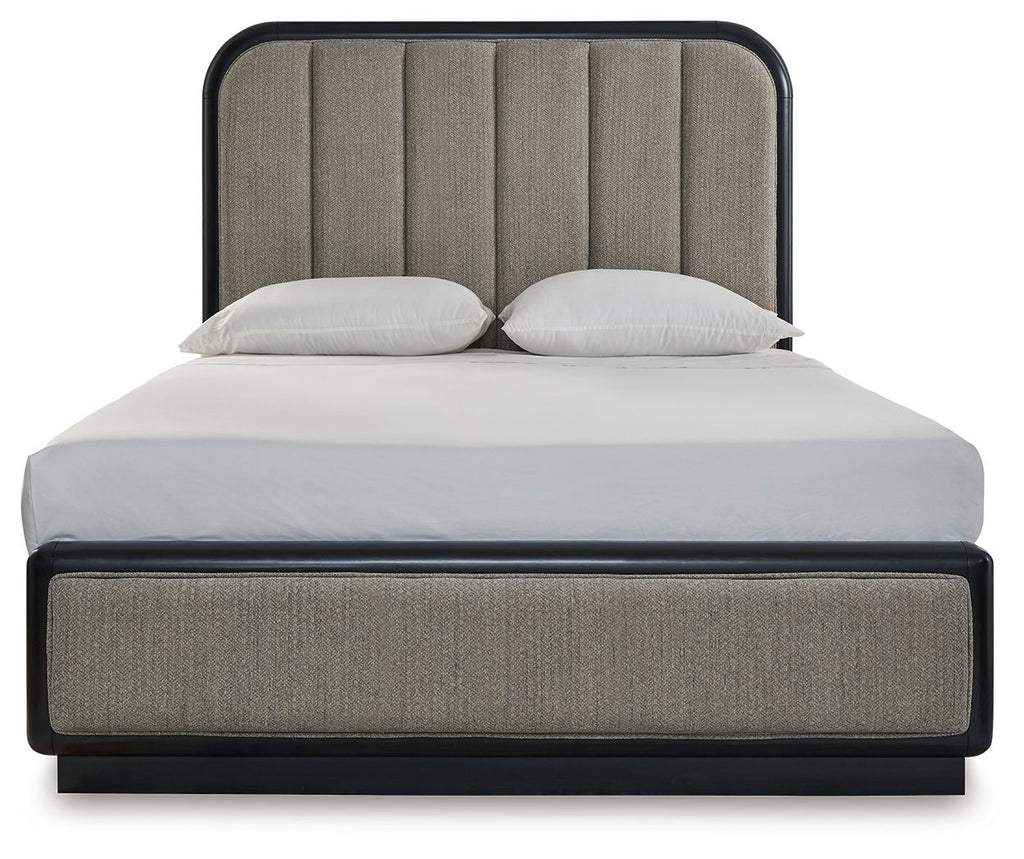Dark gray upholstered panel bed with padded headboard and base