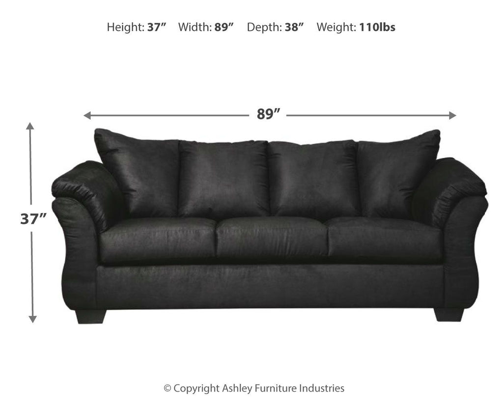 Dark sofa with three seat cushions, channel back, and rolled arms; side view
