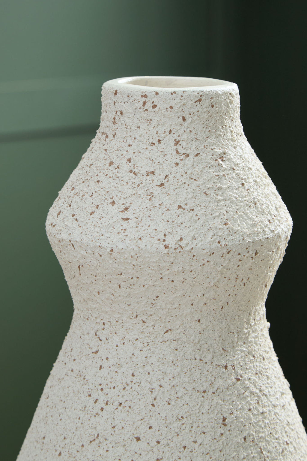 Dawthorne vase in speckled white with rounded shoulders and tapered neck