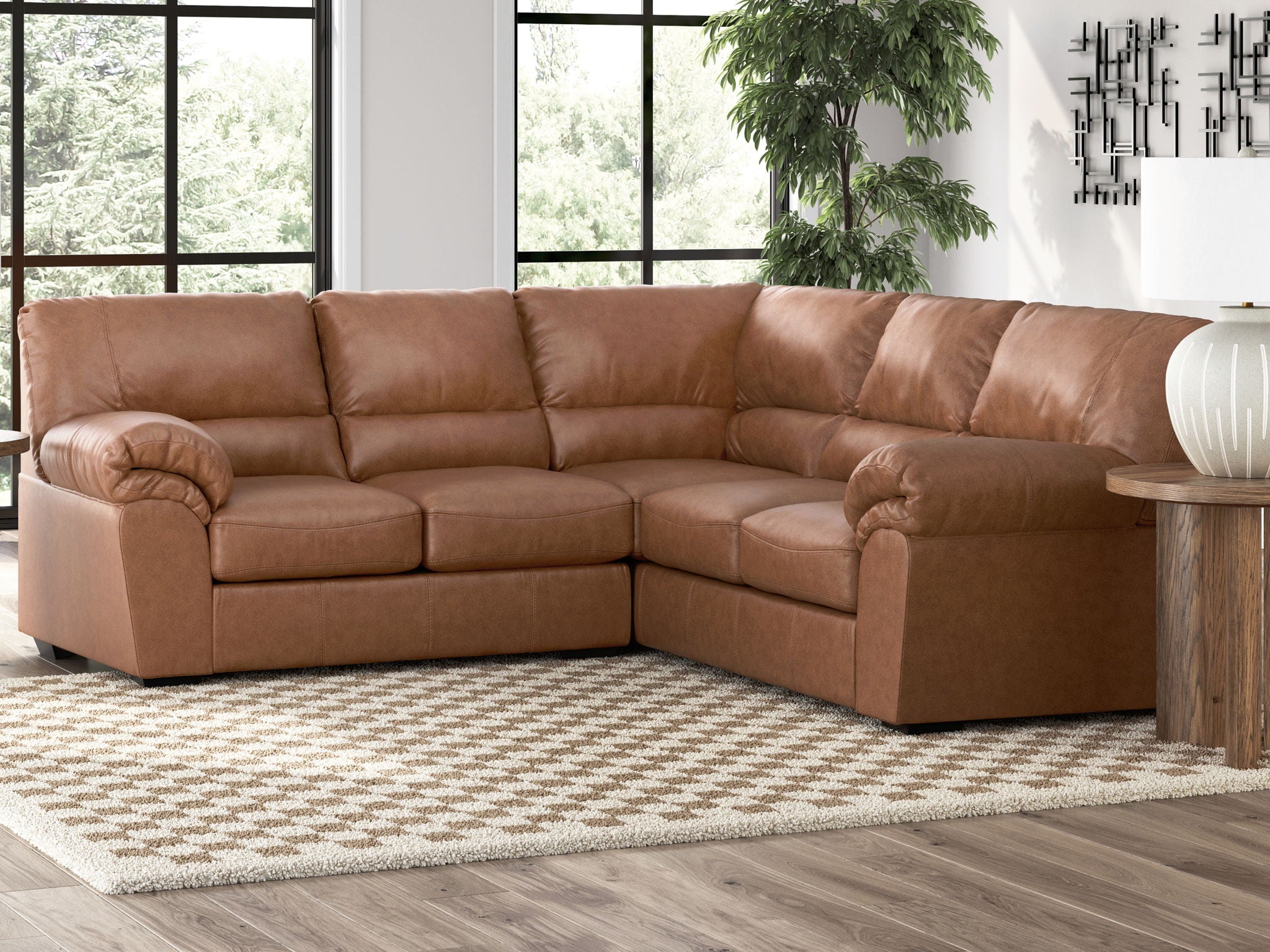 Brown sectional sofa with tufted back and chaise seating