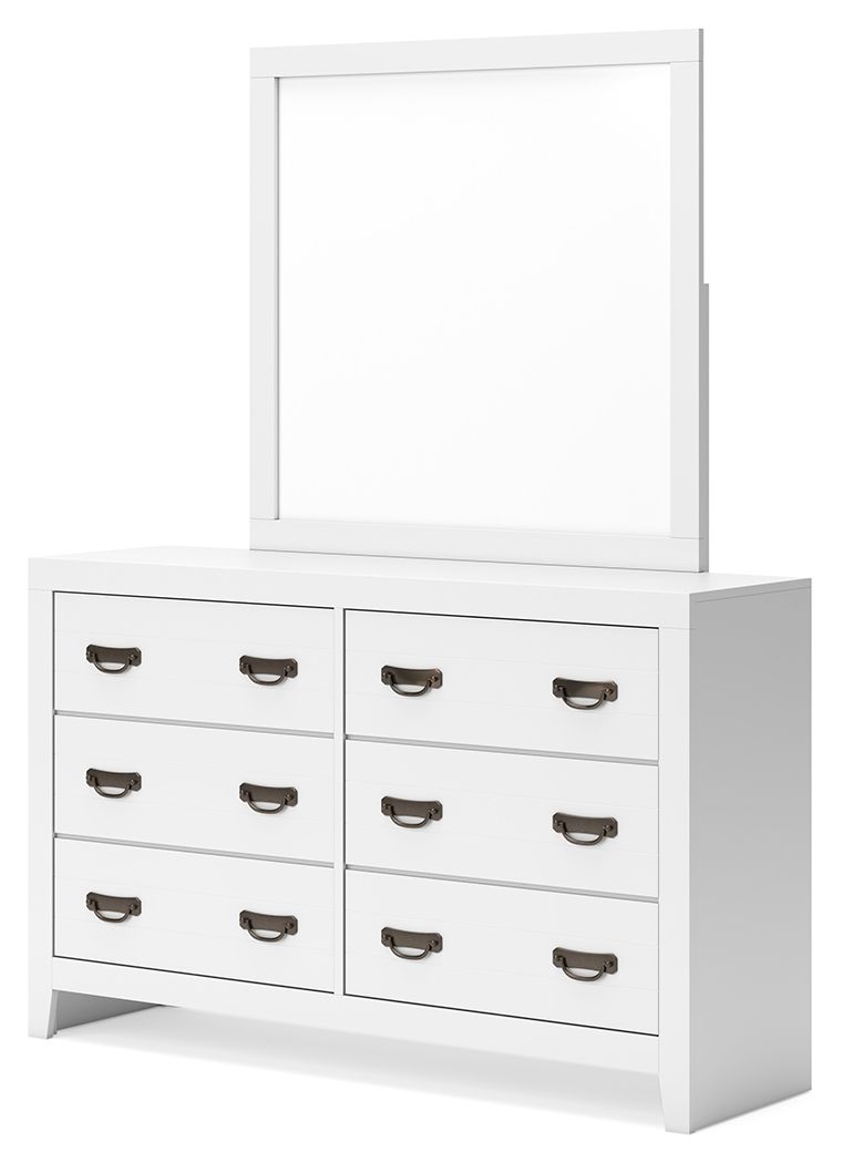 White dresser with attached rectangular mirror and six drawers, bronze cup handles