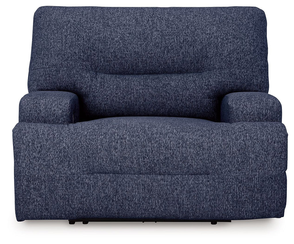 Wide seat power recliner in navy blue, front view with rounded armrests.