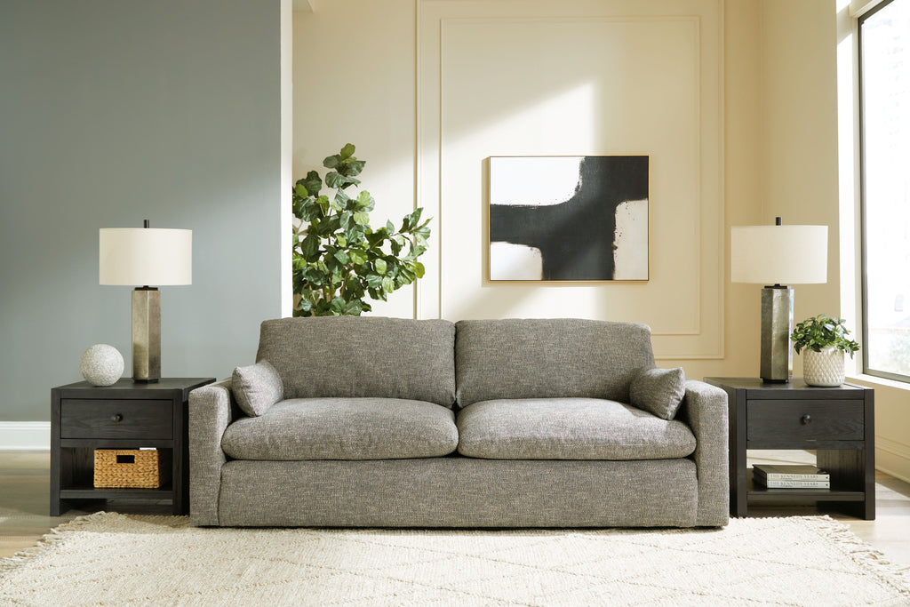 Gray fabric sofa with two seat cushions and squared arms, centered profile.