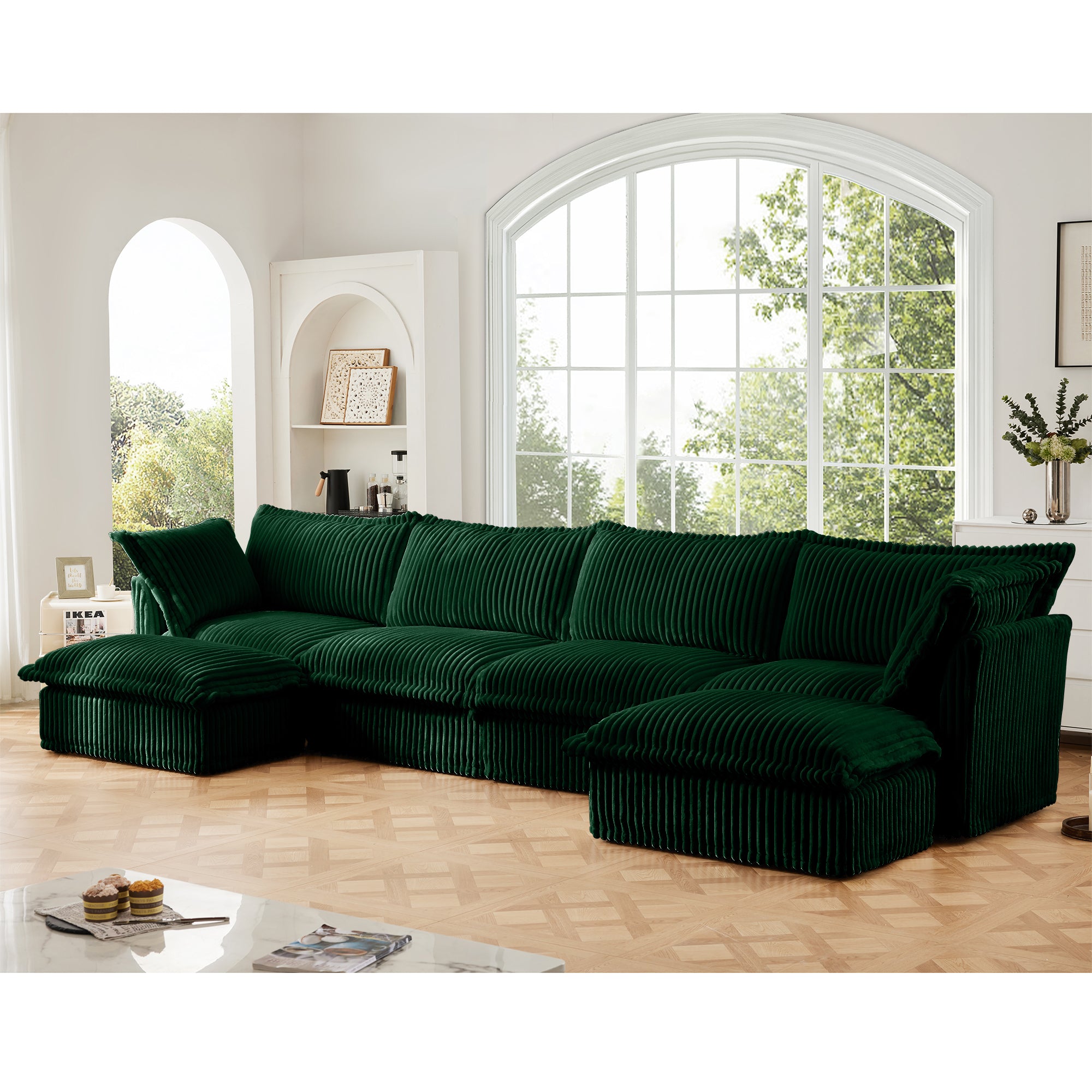 Green corduroy U-shaped sectional sofa with chaise ottoman and long back cushions