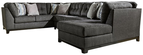 Gray corner sectional sofa with chaise, thick seat cushions, patterned pillows