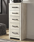 Whitewash chest of drawers with five drawers and black bar pulls