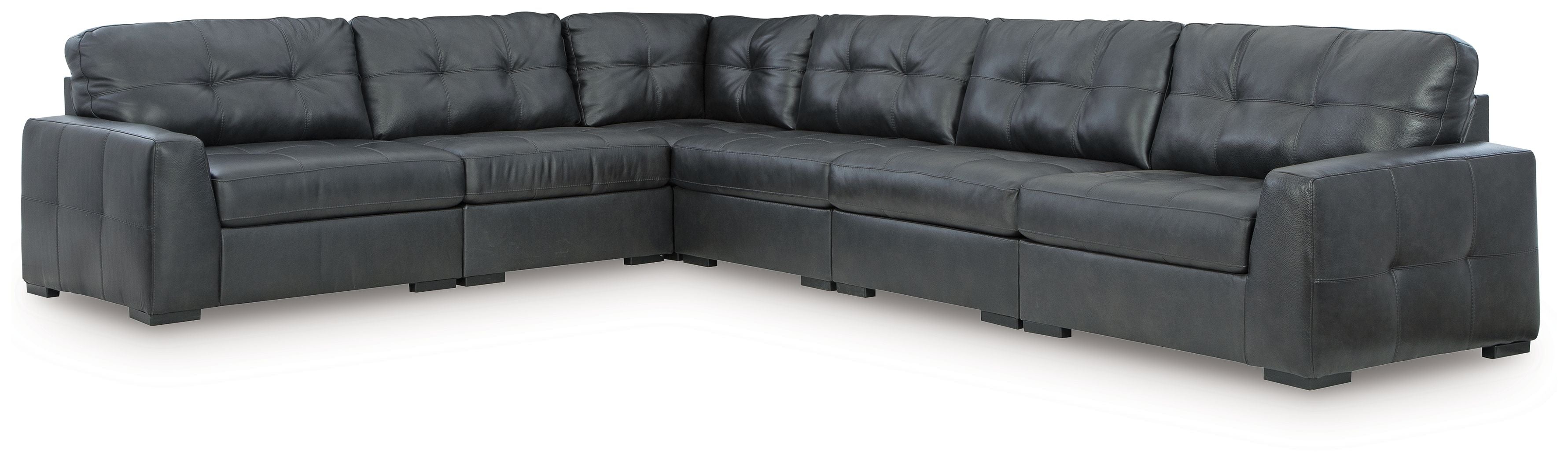 Sectional sofa with corner chaise and tufted cushions in dark upholstery