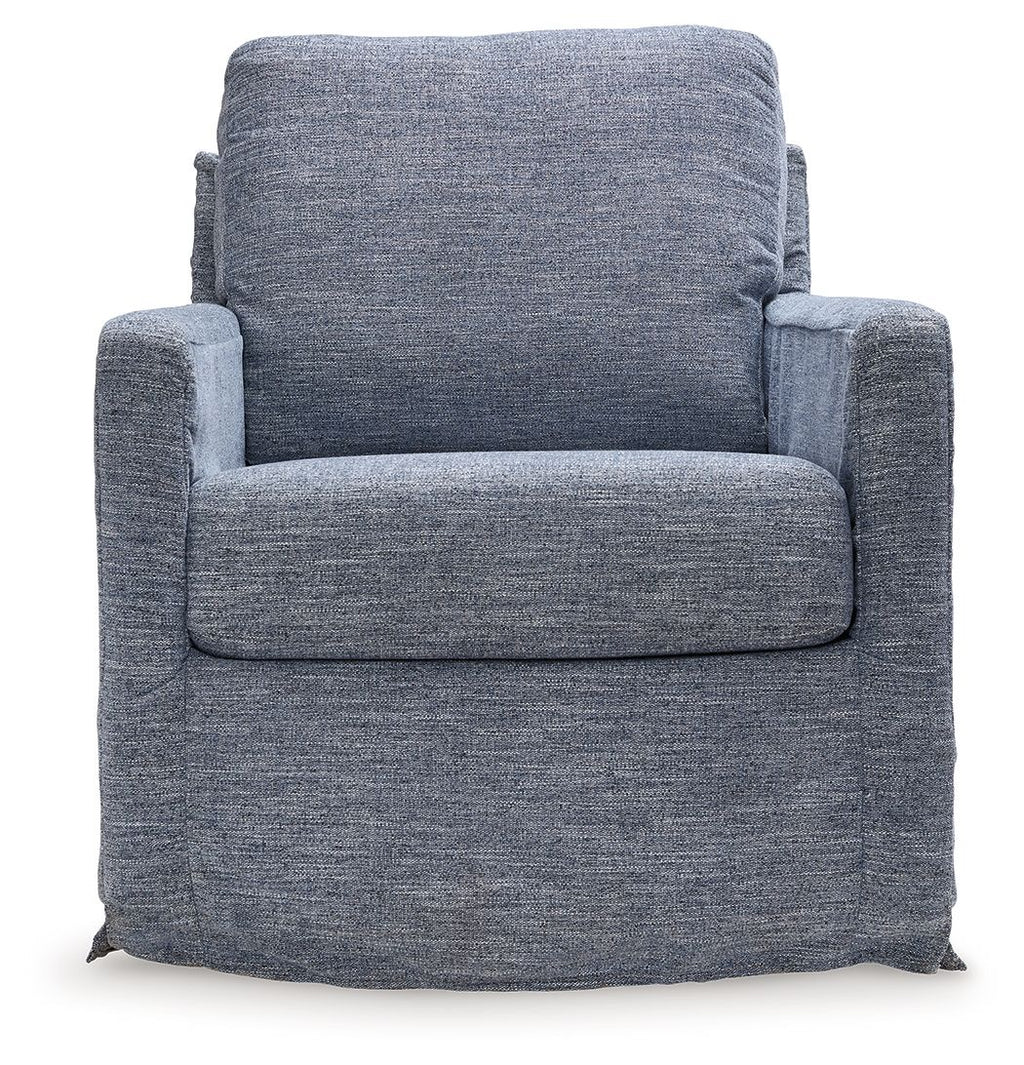 Blue upholstered swivel glider accent chair front view with thick seat and back cushions