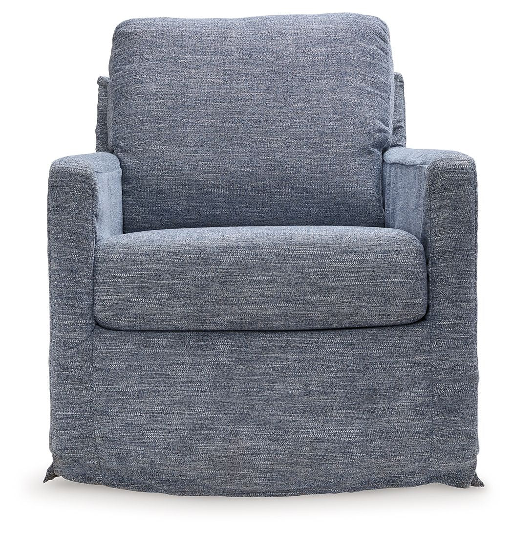 Blue upholstered swivel glider accent chair front view with thick seat and back cushions