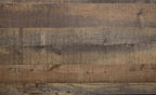 Dark brown wood panel bed frame close-up with textured, distressed finish
