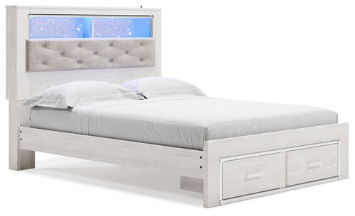 White bookcase bed with tufted gray headboard and two drawer storage footboard
