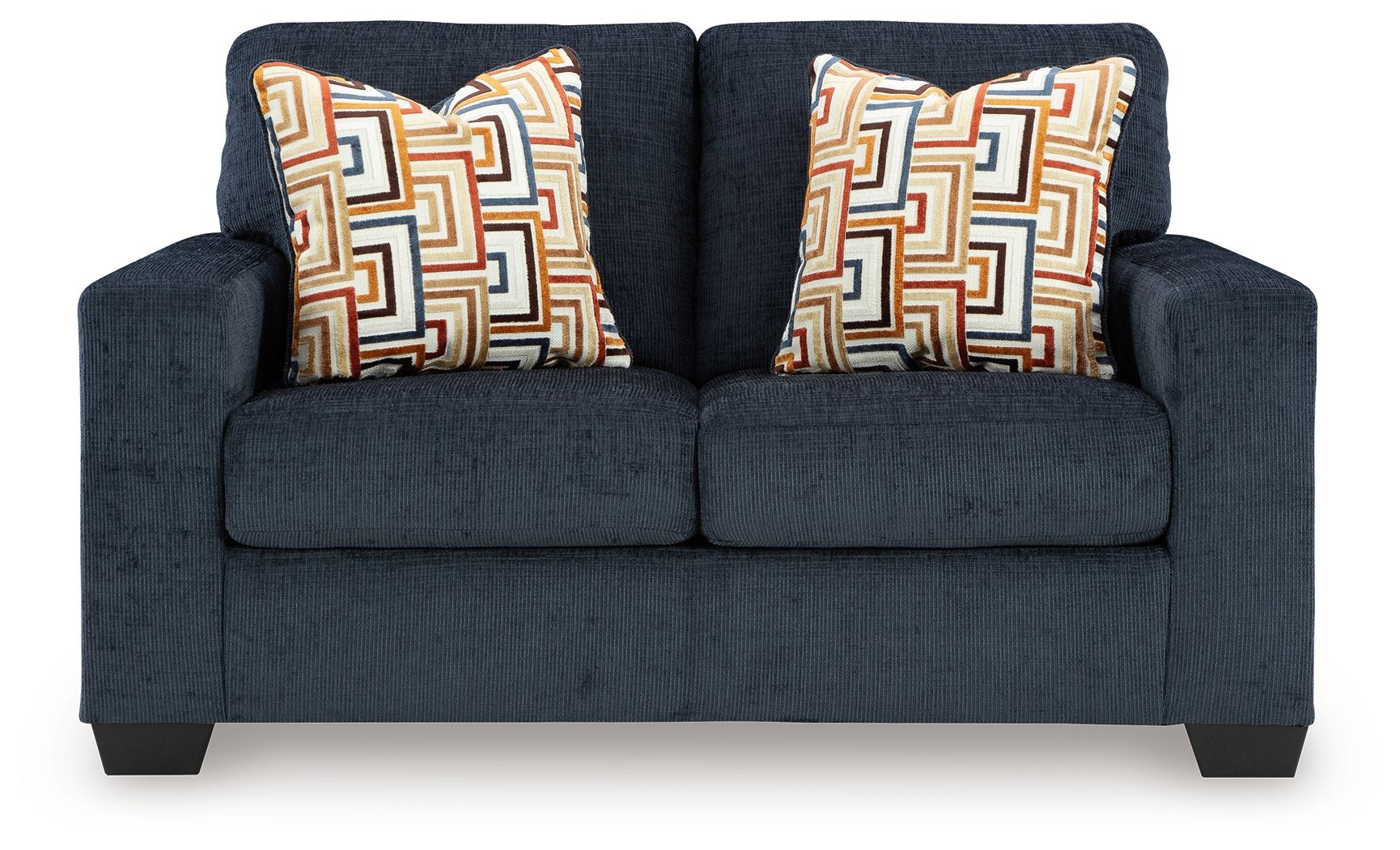 Dark navy loveseat with two patterned throw pillows and thick, square armrests.
