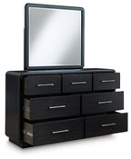 Black dresser with square mirror and stacked drawers with metal bar pulls