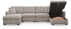 Gray sectional sofa with chaise and open storage console on the corner end