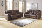Dark brown reclining sofa and loveseat set with padded backs and armrests