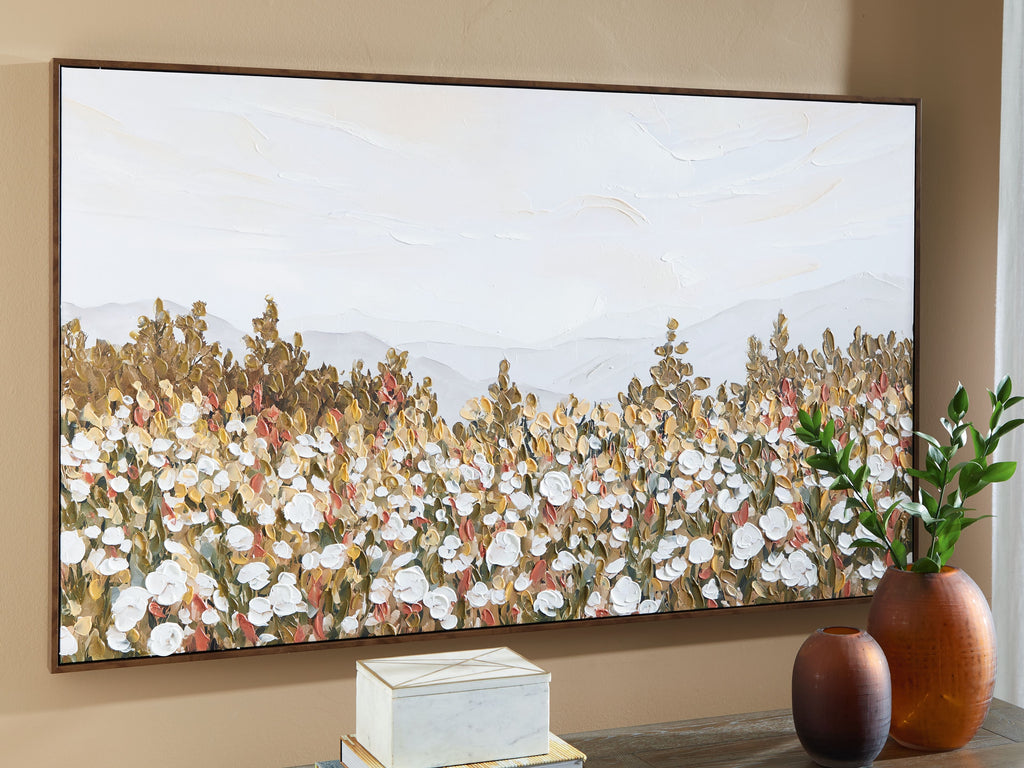 Framed wall art with multicolor foliage and white blossoms under a pale sky