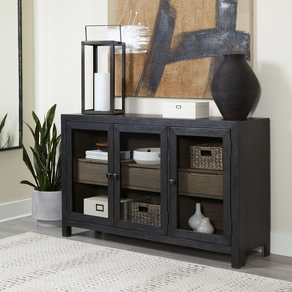 Dark gray accent cabinet with three doors, mix of cubbies and open shelving