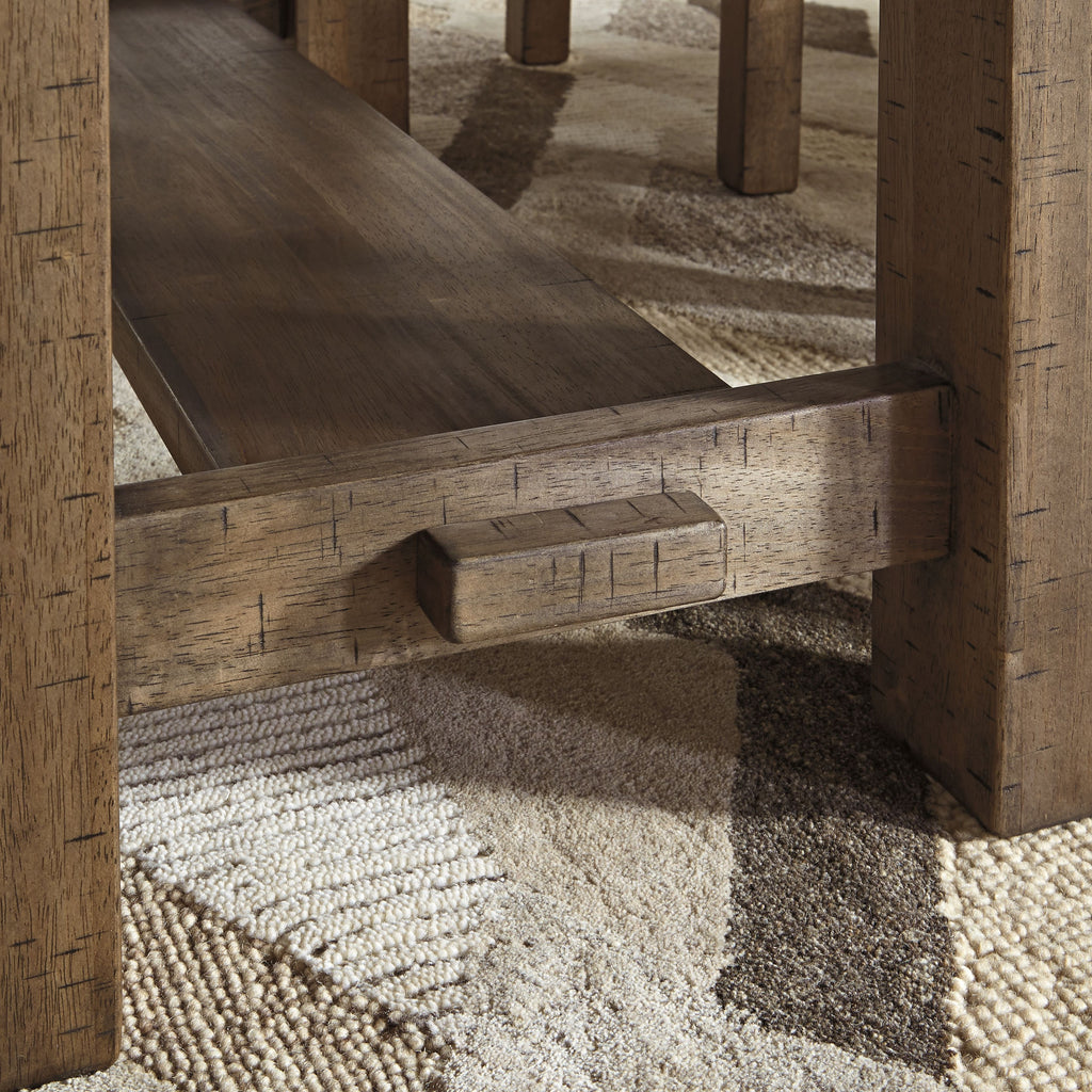 Rectangular table frame in grayish brown wood with carved supports and open apron