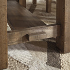 Rectangular table frame in grayish brown wood with carved supports and open apron
