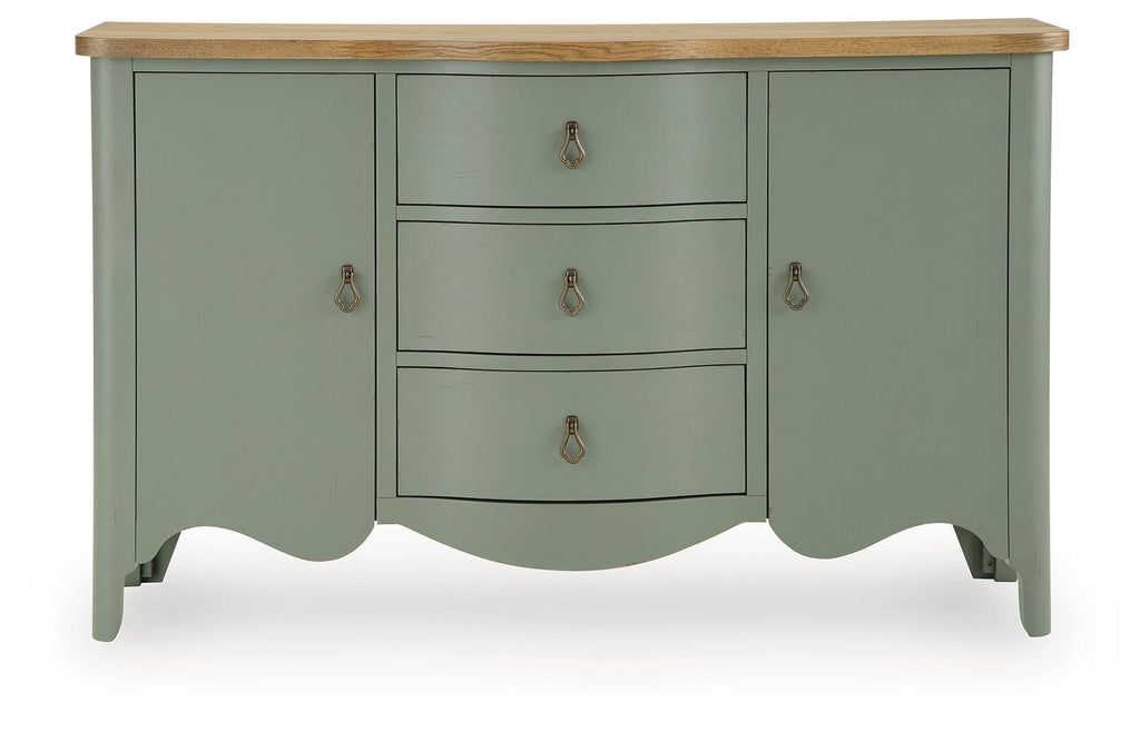 Antique green accent cabinet with wood top and three drawers, scalloped sides, brass pulls