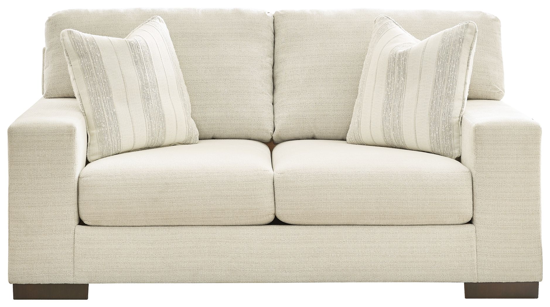 Cream loveseat with rolled arms, two front seat cushions, and three striped pillows