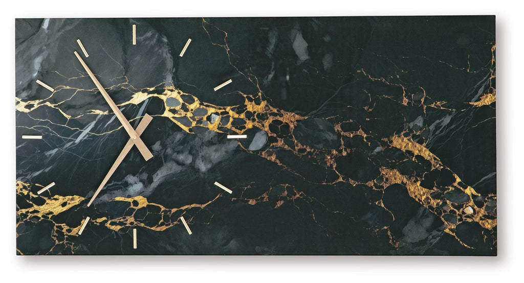 Wall clock with black hands and gold marbling across dark marble panel