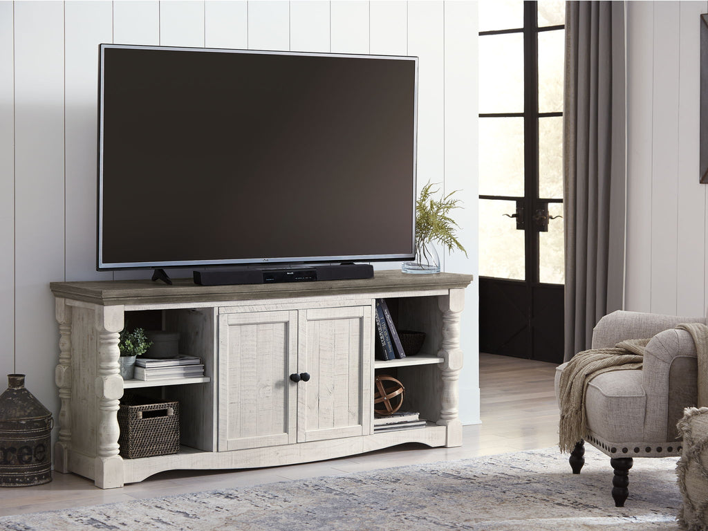 Extra large TV stand in light beige with two doors and dark brown top, TV mounted