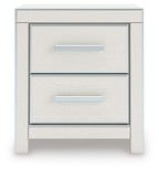 White two-drawer night stand with two silver bar handles and open drawer fronts