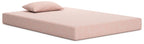 Kids mattress and pillow set, coral-pink with subtle pattern, neatly made