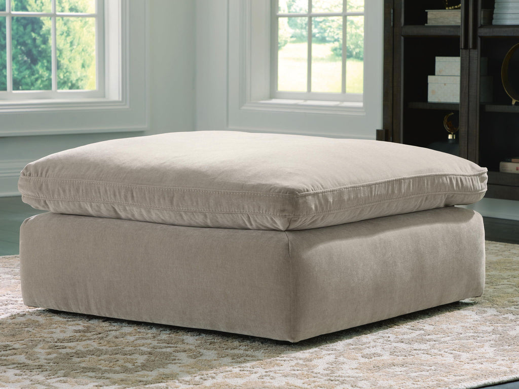 Oversized accent ottoman in light gray, square upholstered top and base