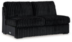 Onyx armless loveseat with ribbed upholstery, rounded seat, and black frame