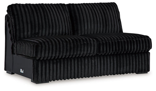 Onyx armless loveseat with ribbed upholstery, rounded seat, and black frame