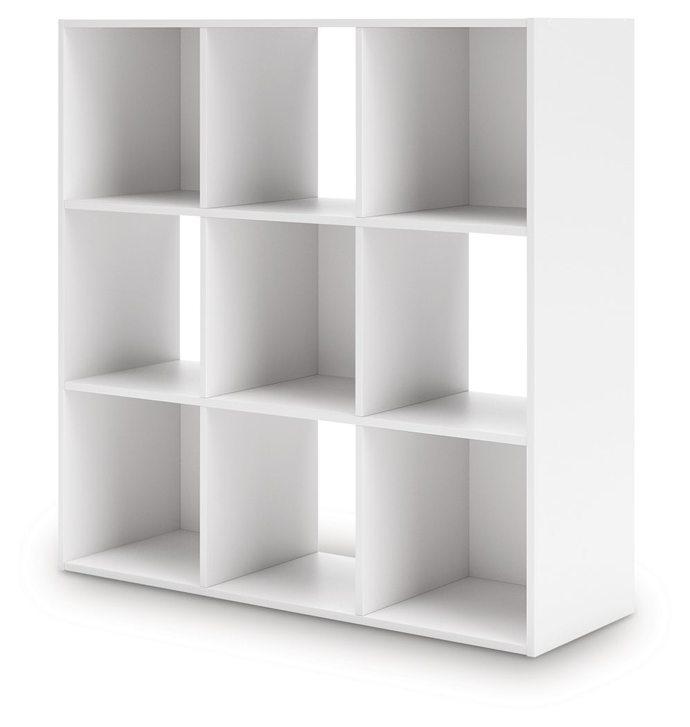 White cube storage organizer with open cubbies, angled view of the shelving unit