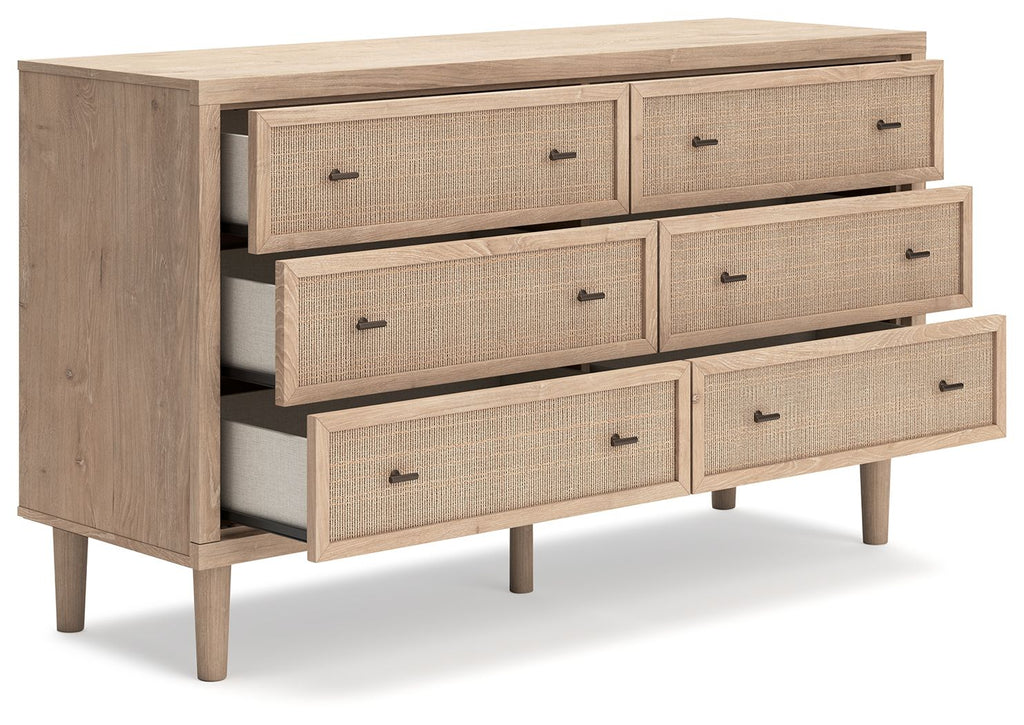 Two-tone six-drawer dresser with drawers pulled open, fabric fronts and dark metal pulls