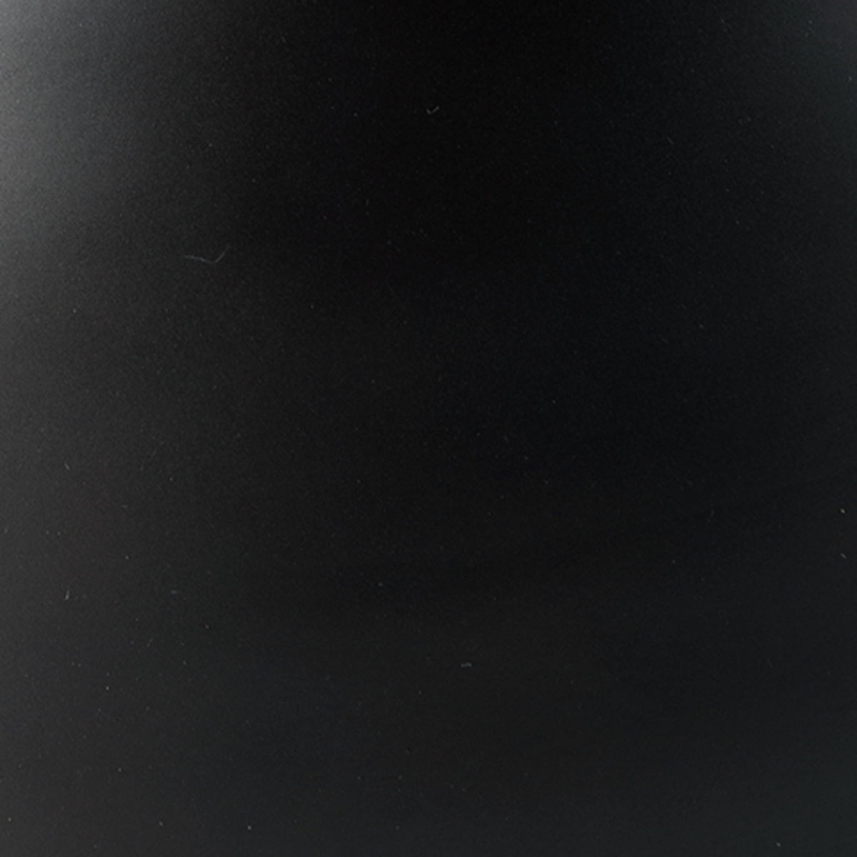 Dark bronze tabletop surface with smooth satin sheen
