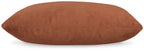 Light brown oblong throw pillow with textured fabric and smooth seams