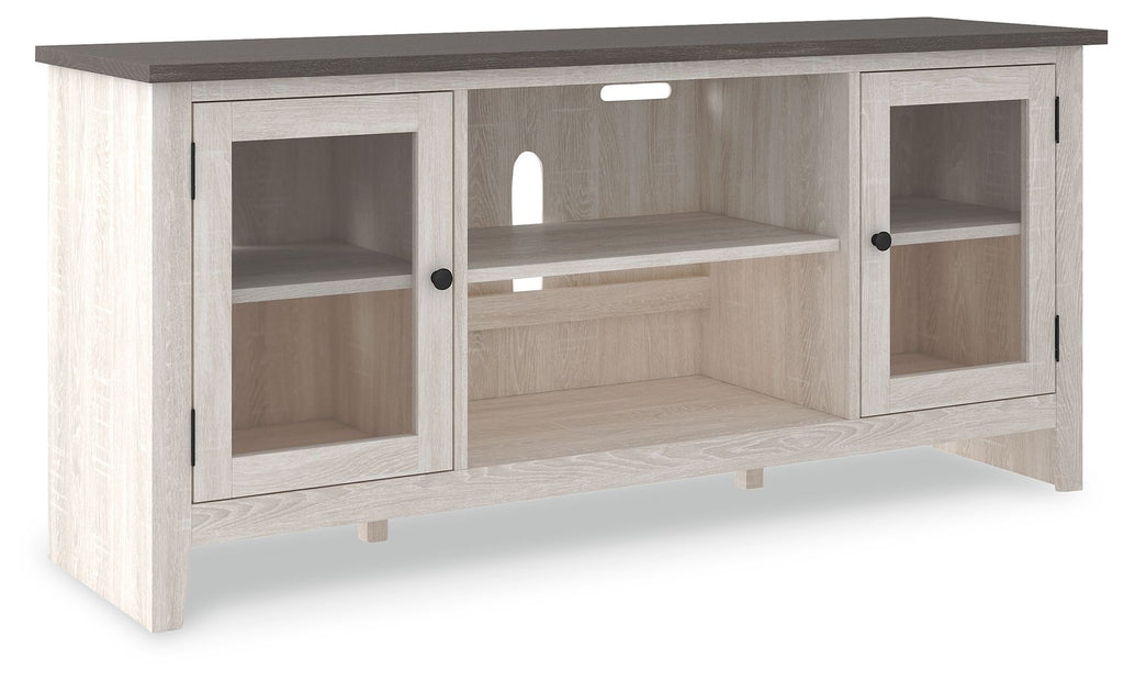 White TV stand with window-style cabinet doors, central open shelves, dark tabletop