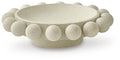 Beige stone-textured decorative bowl with pebble-like scalloped rim, top view
