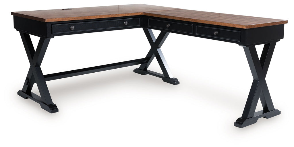 Brown home office desk with black frame and two side drawers