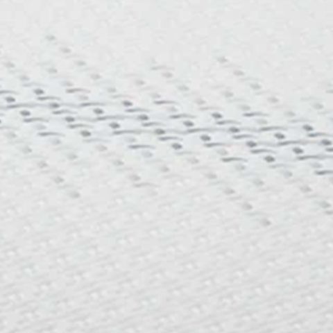 White fabric mattress top with dotted gel-like texture