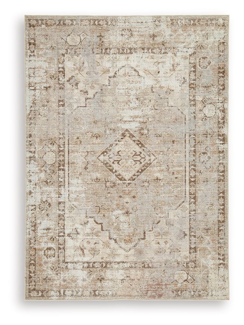 Washable rug with light brown distressed geometric medallion center and border