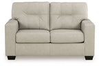 Light beige leather-look loveseat with tufted back and two padded seat cushions, square legs