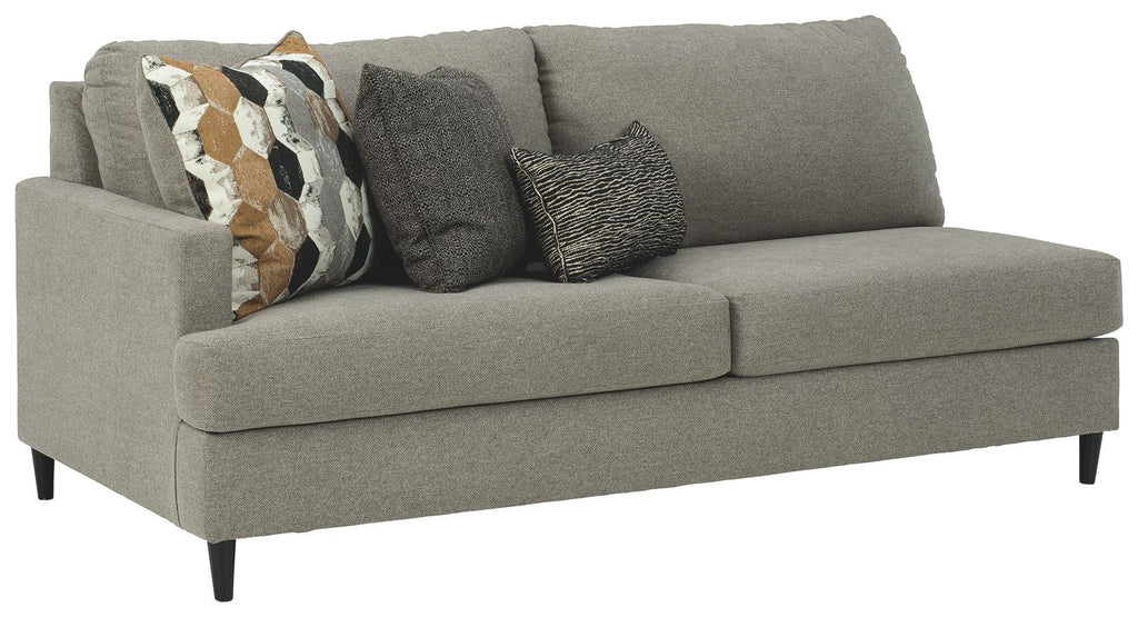 Dark gray fabric sofa with two seat cushions and decorative throw pillows