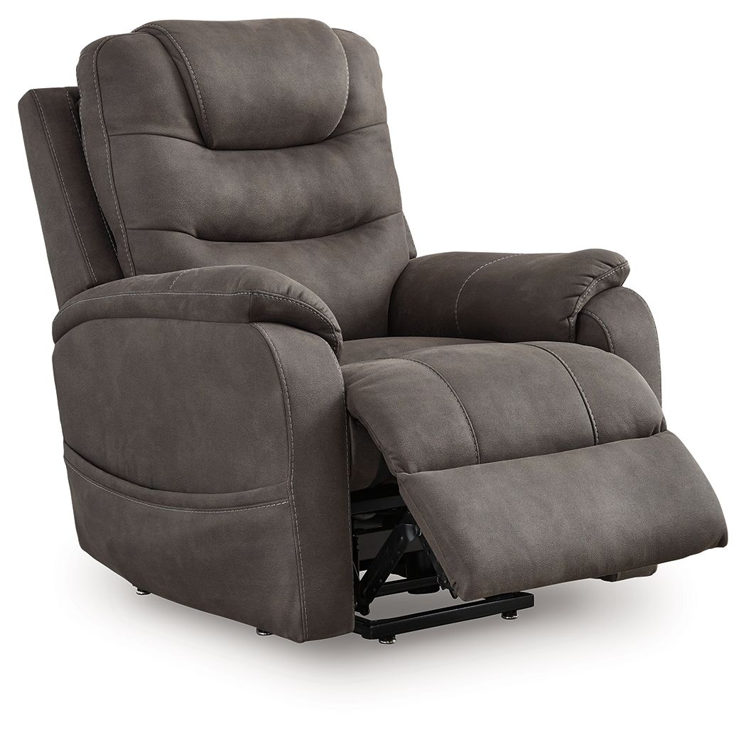 Gunmetal power lift recliner with extended footrest, plush seat and back cushions.