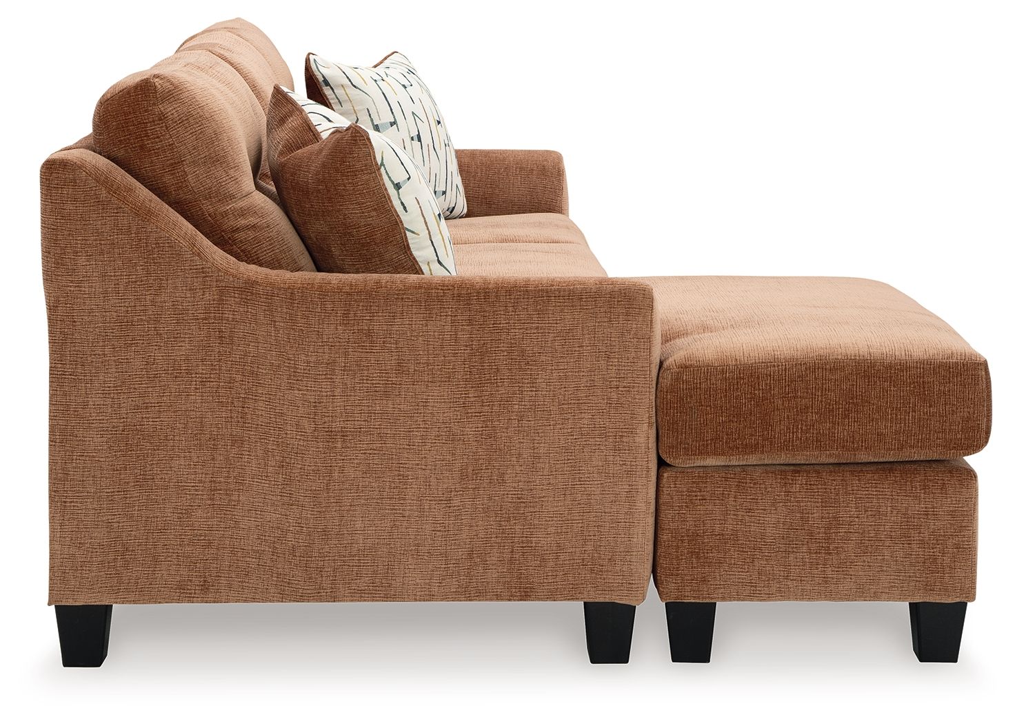 Brown sofa with chaise and matching ottoman, with patterned throw pillows