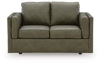 Olive green loveseat with symmetrical arms, two seat cushions, and padded backrest