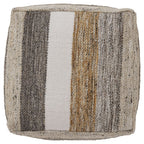Round fabric pouf with vertical stripes in dark gray, white, and tan.