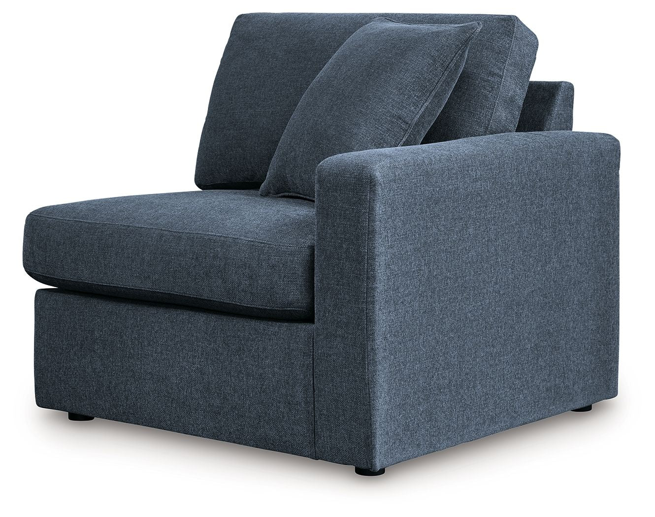 Dark navy upholstered corner chair with two back cushions and rolled right arm