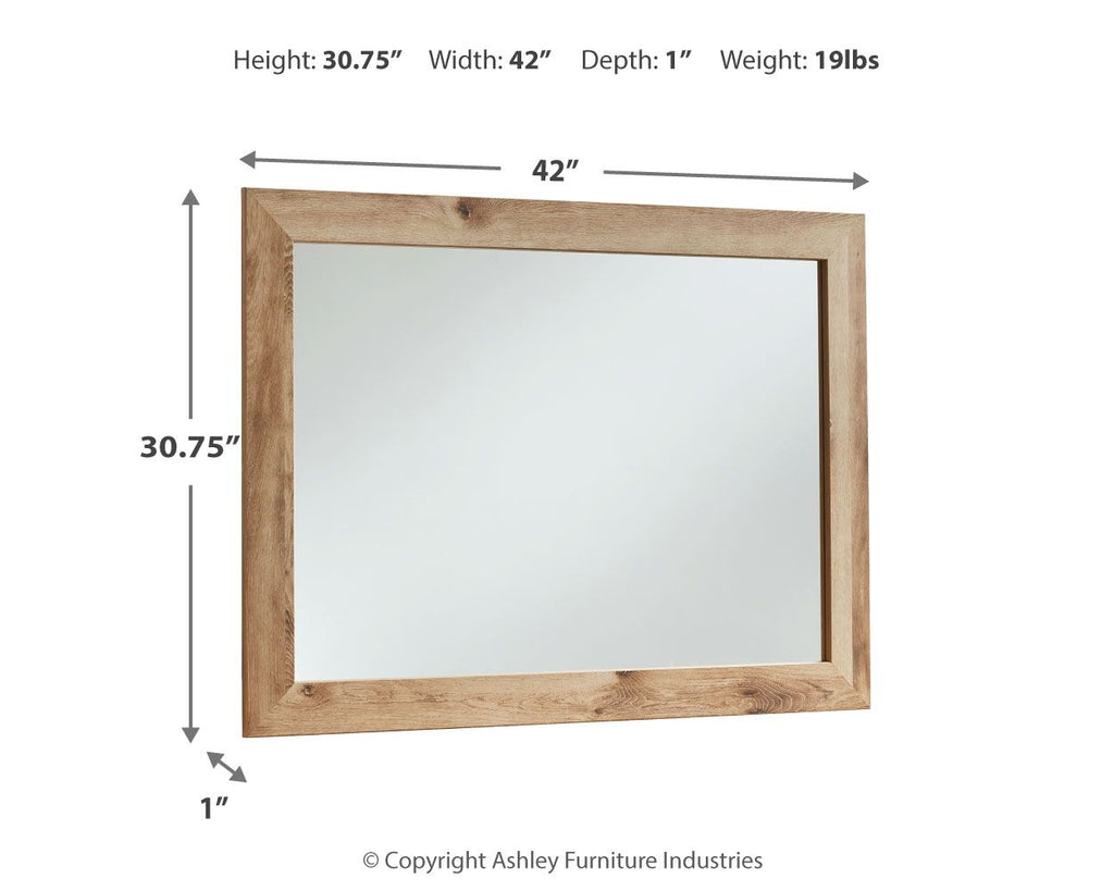 Bedroom mirror with tan brown wood frame and clear glass, rectangular shape
