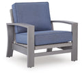 Blue upholstered spring lounge chair with gray frame and padded seat and back cushions